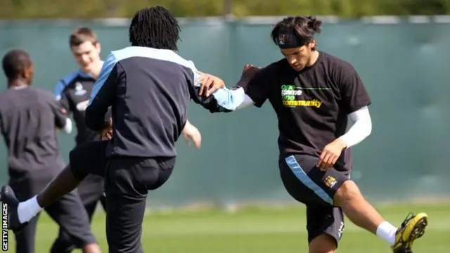 Adebayor and Santa Cruz