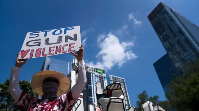 Protesto pedindo controlecassino dadosarmas nos EUA