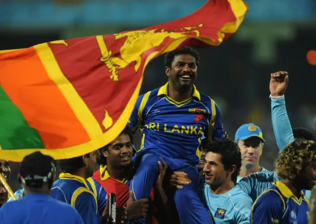 Sri Lankan spinner Muttiah Muralitharan is carried back to the dressing room following the World Cup semi-final game against New Zealand in Colombo on March 29 2011