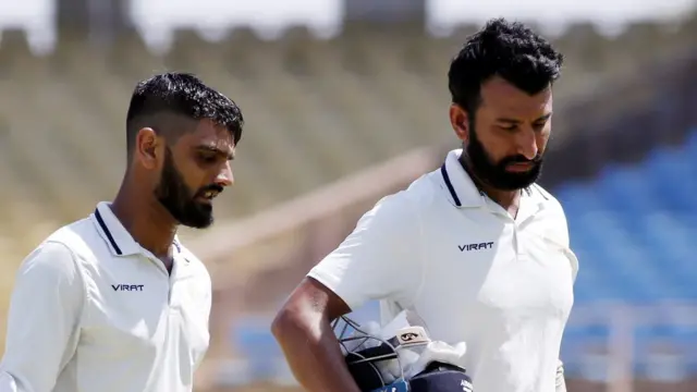 અર્પિત વસાવડા અને ચેતેશ્વર પૂજારા