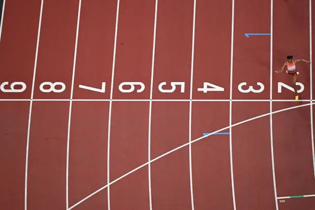 Beatrice Chebet crosses the finish line.