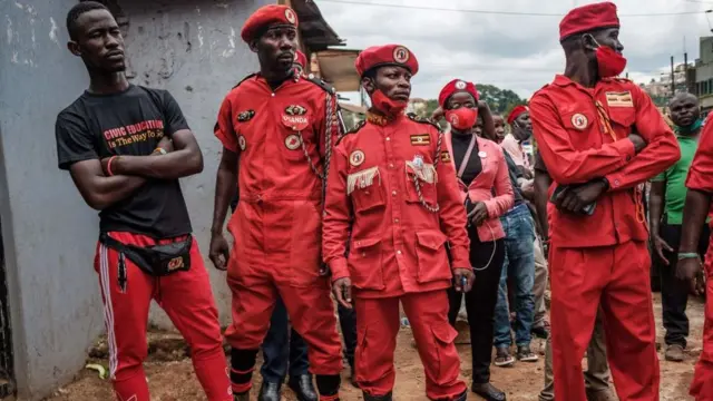 Securities wait for the arrival of Ugandan singer turned politician Robert Kyagulanyi aka Bobi Wine as he becomes President of his new political party National Unity Platform (NUP) at NUP headquaters in Kampala, Uganda, on August 21, 2020. - Kyagulanyi plans to run for President in 2021 elections against the incumbent President Yoweri Museveni who has been in power for 32 years.