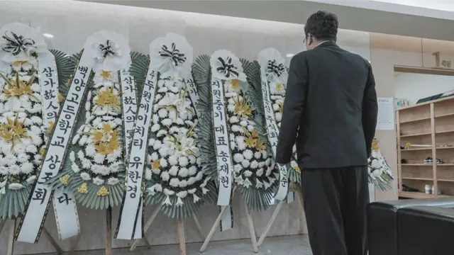 El padre de James Sim.