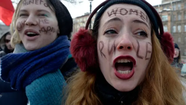 Feminists take part in a rally for gender equality and against violence towards women on International Women's Day in Saint Petersburg on March 8, 2018. / AFP PHOTO / Olga MALTSEVA (Photo credit should read OLGA MALTSEVA/AFP/Getty Images)