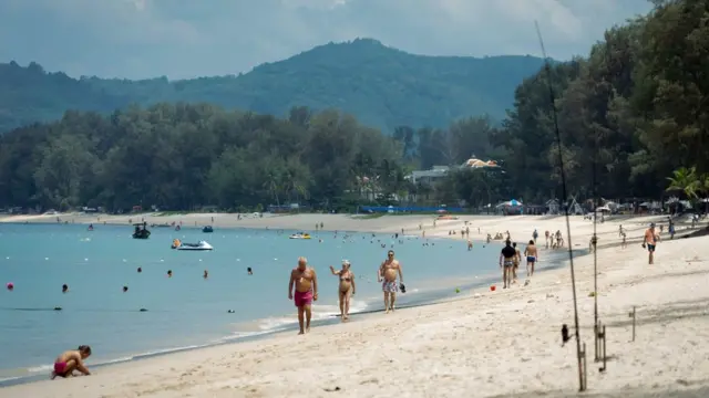 tourists on a beach