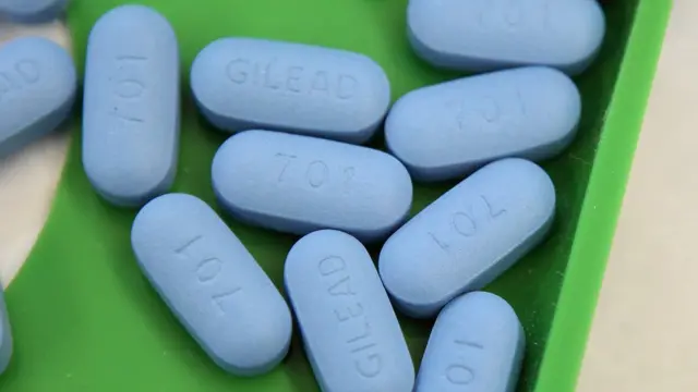 Antiretroviral pills Truvada sit on a tray