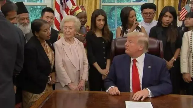 প্রেসিডেন্ট ট্রাম্পের সামনে অভিযোগ তুলছেন প্রিয়া সাহা, যে ভিডিওটি বাংলাদেশে ভাইরাল হয়েছে ।