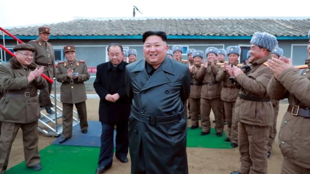 A state media image said to show Kim Jong-un inspecting the testing of a "super-large multiple-rocket launcher"