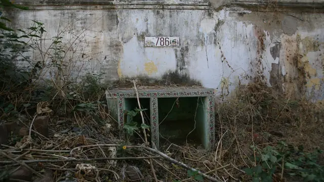 দাঙ্গার সময়ে জ্বালিয়ে দেওয়া হয়েছিল আহমেদাবাদের এই মুসলমান আবাসনটি