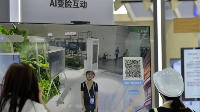 Staff members interact with human-like AI-generated models at Huawei booth ahead of the 2024 World Intelligence Expo at the National Convention and Exhibition Center (Tianjin) on 18, 2024 in Tianjin, China. The 2024 World Intelligence Expo will be held in Tianjin from June 20 to 23