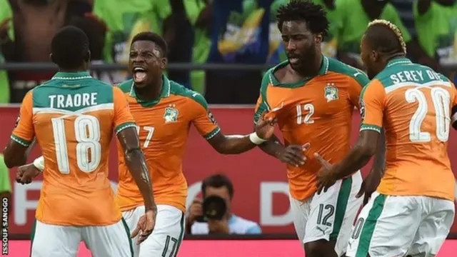 Players from Côte d'Ivoire team dey jubilate