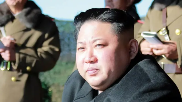 金正恩标志性的发型。