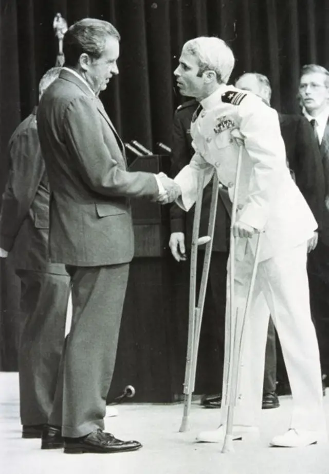 McCain is welcomed home to Washington, DC by US President Richard Nixon