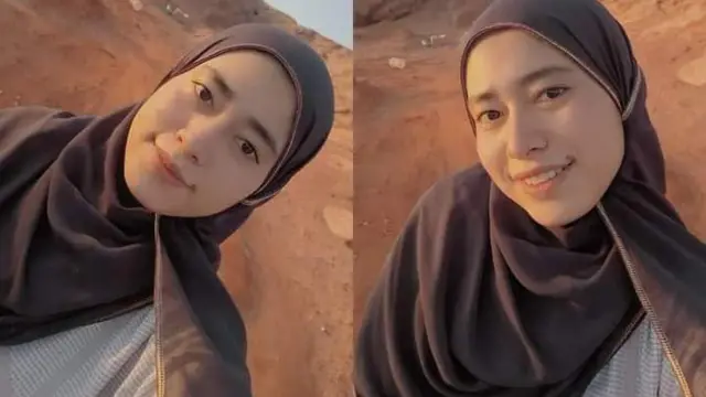 Siti Aminah saat berusia 19 tahun di Arab Saudi, dia berfoto selfie, tampak mengenakan jilbab warna cokelat.