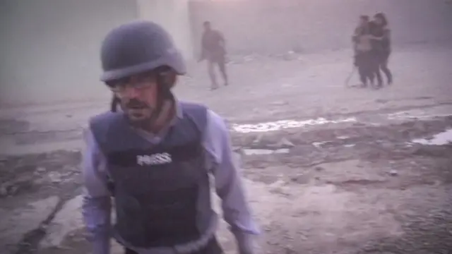 صورة تظهر خوف الناس في أعقاب انفجار في مدينة الموصل