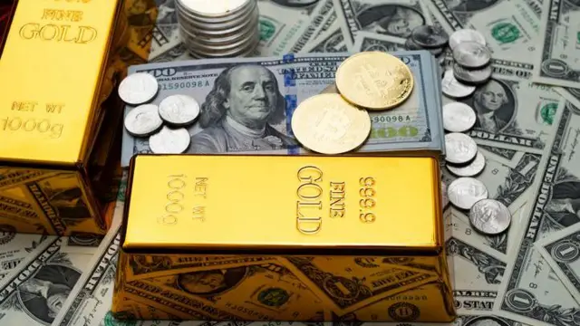 डॉलर और सोने की ईंट