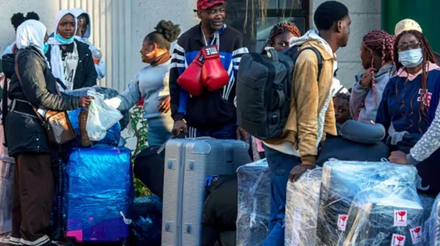 Nigerian national carry boxes