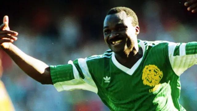 Roger Milla celebrates a goal at the 1990 World Cup