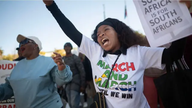 Various groups protest during one march against illegal immigrants on June 30, 2026 for Pretoria, South Africa. 