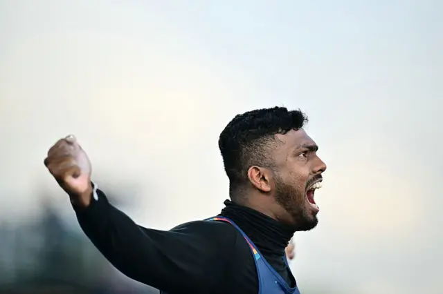 Sri Lanka's Rumesh Tharanga Pathirage reacts as he competes in the men's javelin throw final during the athletics event at the Scotstoun Stadium in Glasgow, on day eight of the Commonwealth Games in Glasgow, Scotland, on July 31, 2026. (Photo by Ben STANSALL / AFP via Getty Images)