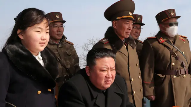 Kim Jong Un and Kim Ju Ae watch a missile drill at an undisclosed location, March 2023