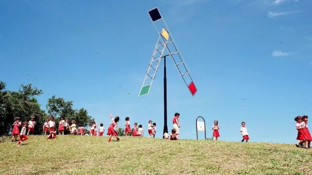 Children from Gaviotas playing near one of Gaviotas' ecological inventions