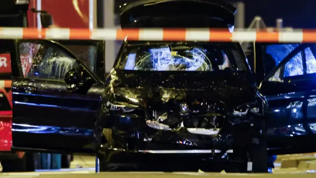 The car that plowed into a large crowd of revelers at a Christmas market in Magdeburg is shown following the attack in Magdeburg, Germany.