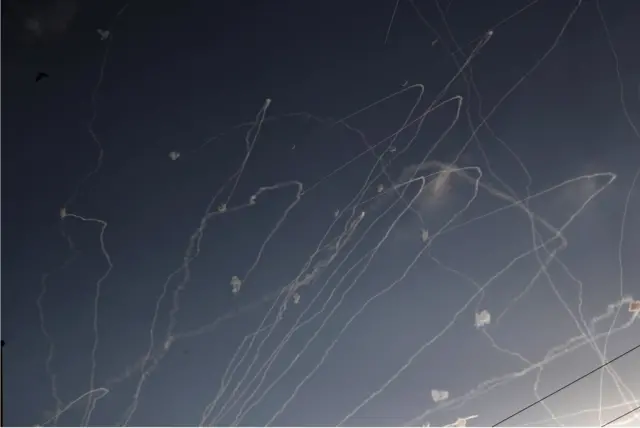 Missiles launched from the Gaza Strip towards the Israeli city of Ashkelon interrupted by the Israeli air defense system of Iron Dome over th city of Ashkelon, 10 October 2023