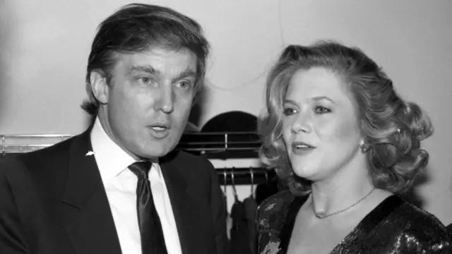 Businessman Donald Trump chats with actress Kathleen Turner at the D W Girffith Awards At Lincoln Center Library in February 1988