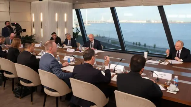 Russian President Vladimir Putin meets with the representatives of the management of global news agencies as part of the St. Petersburg International Economic Forum (SPIEF), at Lahta Center on June 05, 2024 in St.Petersburg, Russia