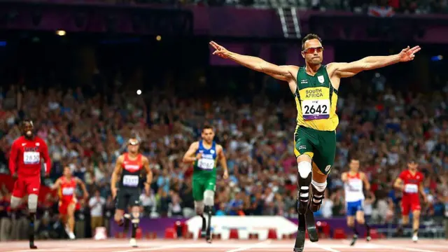 LONDON, ENGLAND - SEPTEMBER 08: Oscar Pistorius of South Africa celebrates as he wins gold in the Men's 400m T44 Final on day 10 of the London 2012 Paralympic Games at Olympic Stadium on September 8, 2012 in London, England.