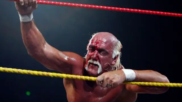 Hulk Hogan with a bloodied face and eyes closed clinging on to the ropes during his 'Hulkamania Tour' at Acer Arena on November 28, 2009 in Sydney, Australia
