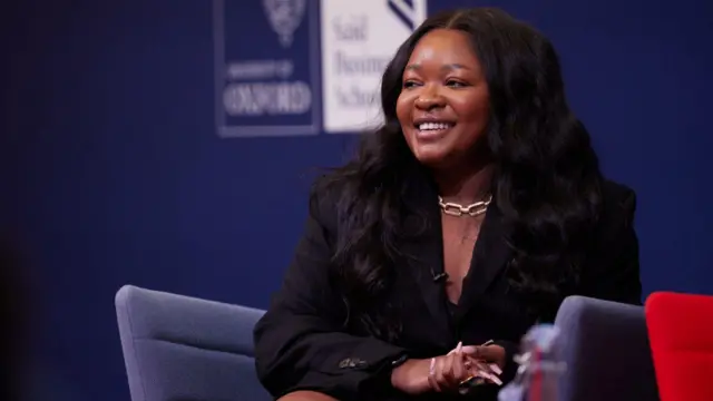 photo of Tendai Moyo at a conference