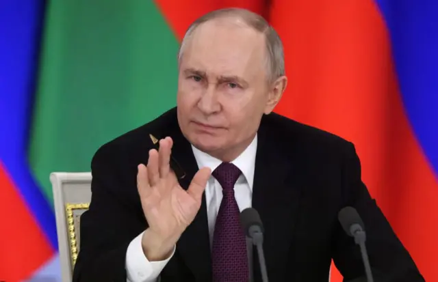 Путін