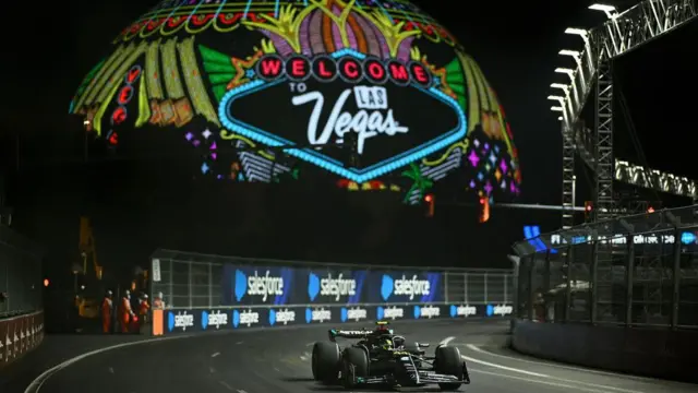 Lewis Hamilton drives past the Sphere in Las Vegas