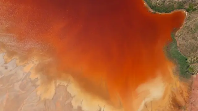 Aerial shot of oxidized iron minerals in water in old mining area. Río Tinto. Huelva Province. Spain