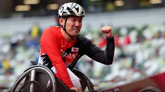 Tokyo 2020 Paralympic Games - Athletics - Men's 100m - T52 Final - Olympic Stadium, Tokyo, Japan - September 3, 2021. Yuki Oya of Japan celebrates after winning silver REUTERS/Athit Perawongmetha