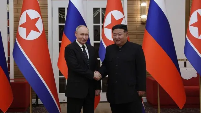 Apertobonus deposito sportingbetmãosbonus deposito sportingbetVladimir Putin e Kim Jong Un na Coreia do Norte com bandeiras ao fundo