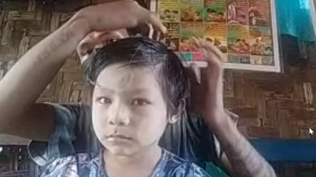 လက်နက်ကြီးကျည်စ ရှိနေနနိုင်တဲ့နေရာကို သူ့ဖခင်က ပြောပြနေပါတယ်