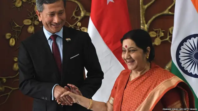Indian Foreign Minister Sushma Swaraj (R) greets Singapore's Foreign Minister Vivian Balakrishnan prior to a meeting in New Delhi on October 31, 2017.