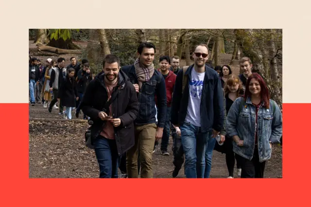 People walking through a London park