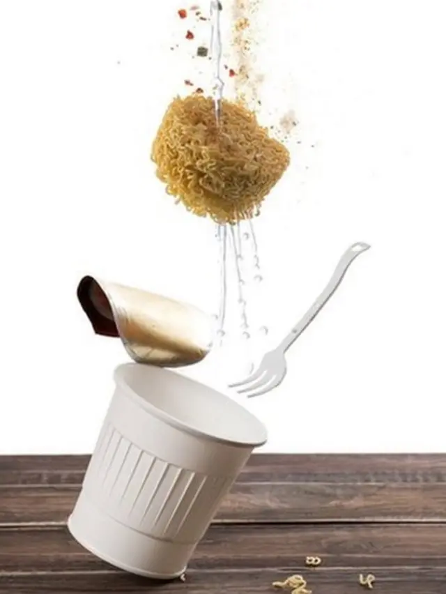 Flying instant cup noodle on white background ,instant cup noodle floating