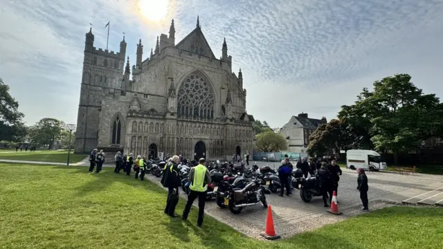 Bell-ringing bikers ring out at Devon cathedral - BBC News