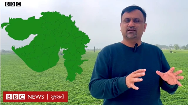 હવામાન વિશે માહિતી આપી રહેલા દીપક ચુડાસમાની તસવીર 