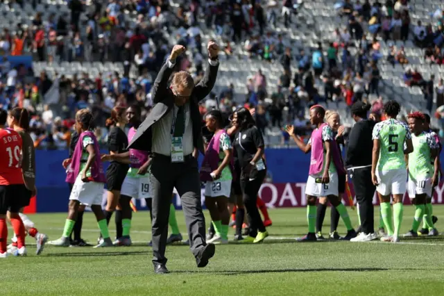 GRENOBLE, FRANCE - JUNE 12: Thomas Dennerby, Head Coach of Nigeria celebrates following his sides victory in the 2019 FIFA Women's World Cup France group A match between Nigeria and Korea Republic at Stade des Alpes on June 12, 2019 in Grenoble, France. (Photo by Naomi Baker - FIFA/FIFA via Getty Images)