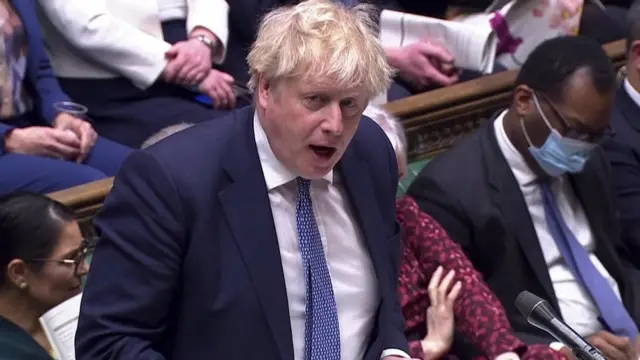 British Prime Minister Boris Johnson speaks during the weekly question time debate at Parliament in London, Britain, February 2, 2022, in this screen grab taken from video.