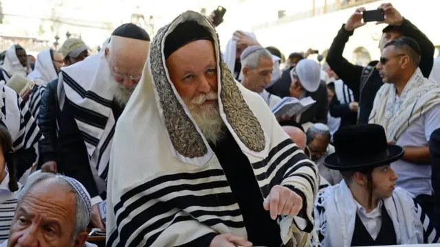 Jews gather by the Western Wall to receive the Priestly Blessing during the Jewish feast of Passover