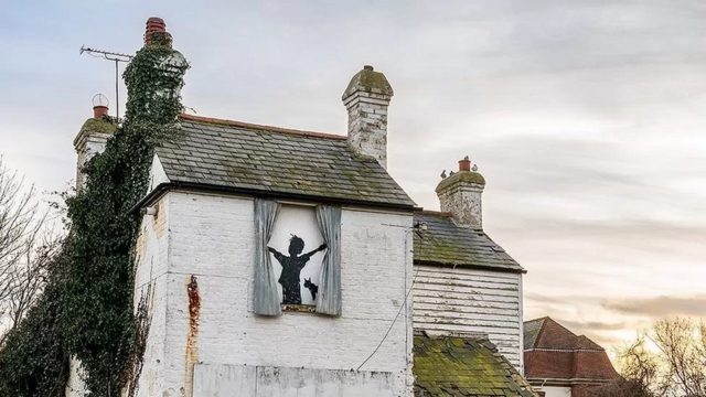 Fotografia mostra grafiterivalo aposta grátismenino abrindo janela ao ladorivalo aposta grátisum gato