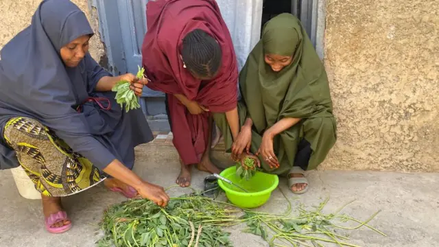 Fatima doing some chores for house