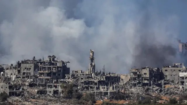 Smoke rises over Gaza as seen from Southern Israel, amid the ongoing conflict between Israel and Palestinian group Hamas, 10 November 2023.
